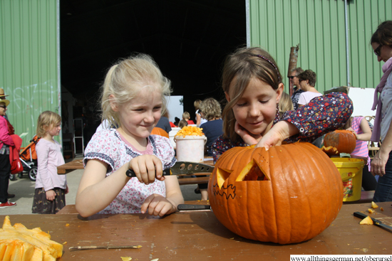 Katharina (left) and Emma-Fee (right) carving a pumpkin at the maize maze on Sunday, 28th September, 2014